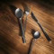 Cutlery set for 24 place settings solid handle serrated